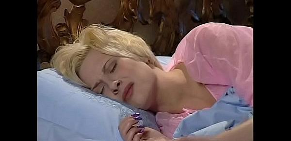 Sweet sleeping blonde has a hot awakening in her bed